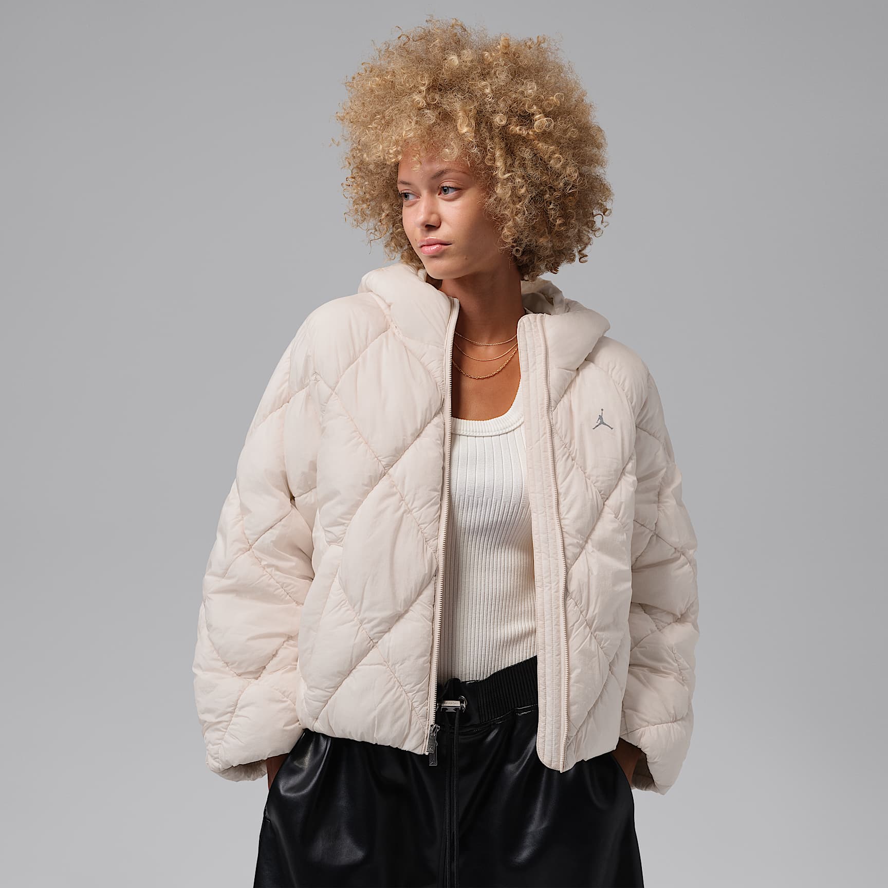 Jordan Brooklyn Women's Puffer Jacket. Nike SK